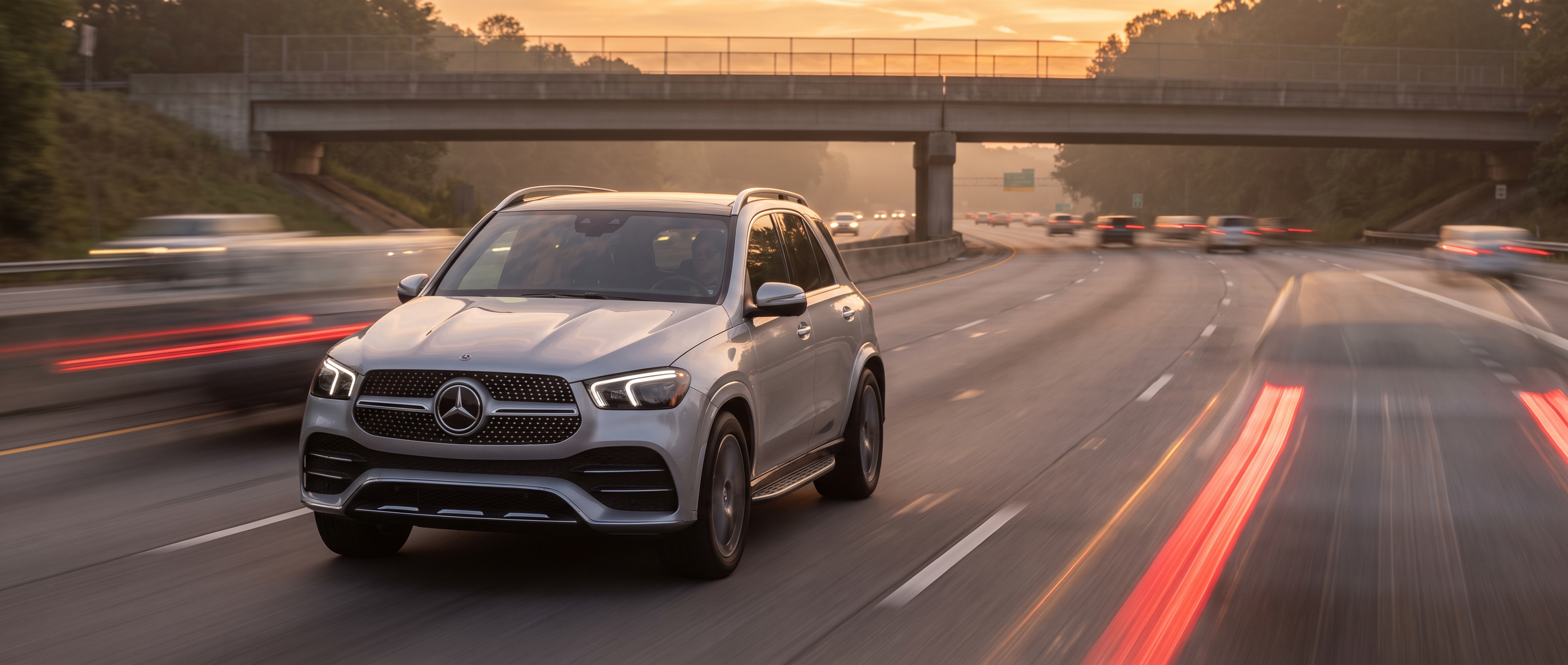 Mercedes-Benz GLE on I-85 near Duluth, GA during holiday traffic at dusk